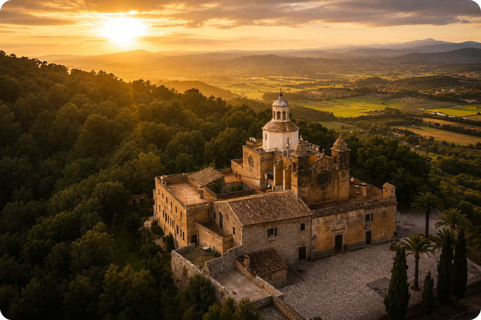 Aerial view of the Ermita de Bonany sanctuary above Petra at sunset